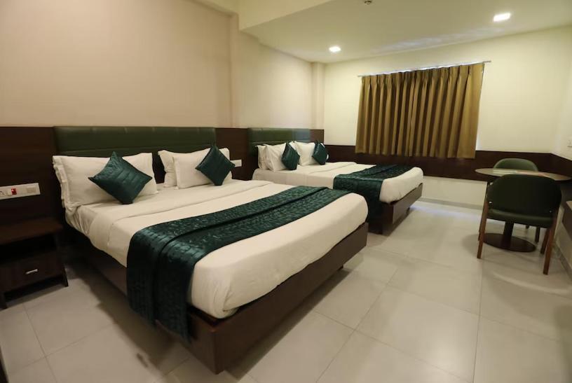 Greenotel Rooms Hazira, Surate Extérieur photo