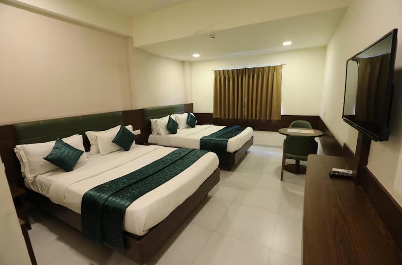 Greenotel Rooms Hazira, Surate Extérieur photo