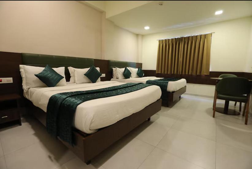 Greenotel Rooms Hazira, Surate Extérieur photo